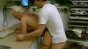 Blonde waitress in stockings is fucked in the kitched